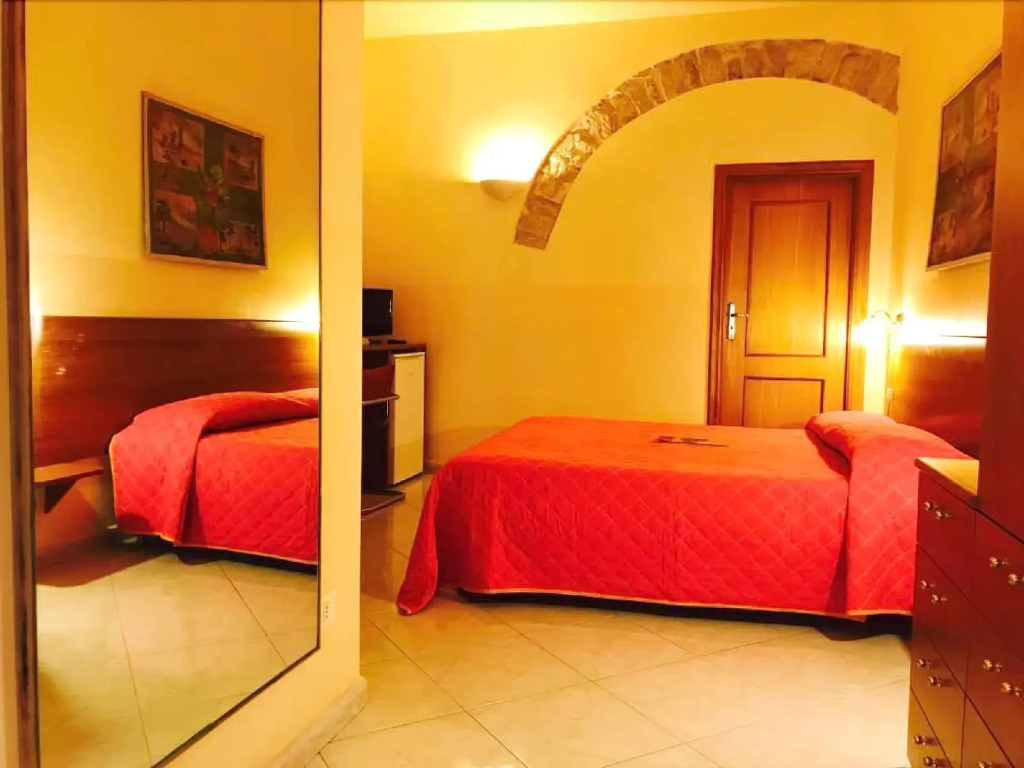 Corato room economy