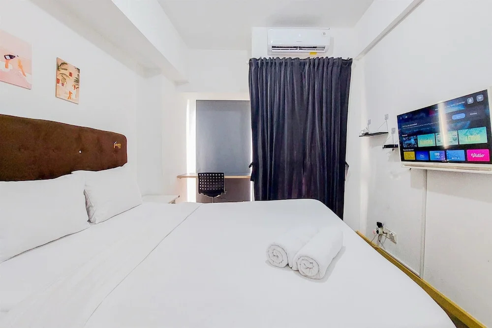Modern Studio M-Town Residence Apartment near Shopping Mall By Travelio