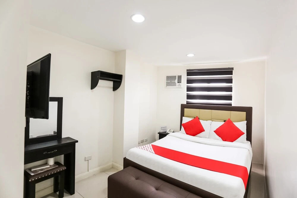 OYO 393 Triangle Apartelle