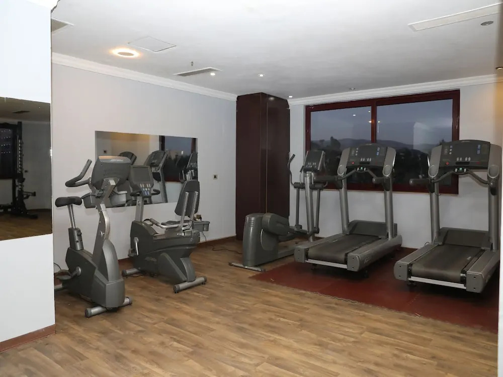 Kenenisa.. Oasis International Hotel