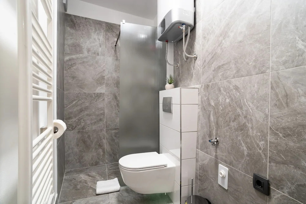 CAPRARIA appartments in historic center, with private parking