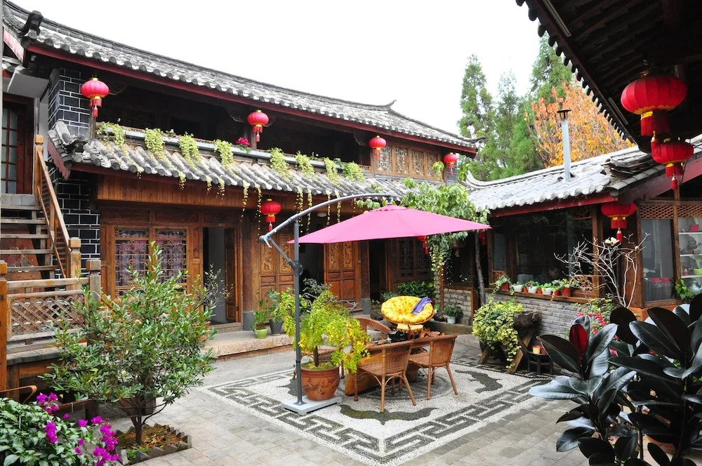 丽江南有府丨鉴山设计师庭院民宿