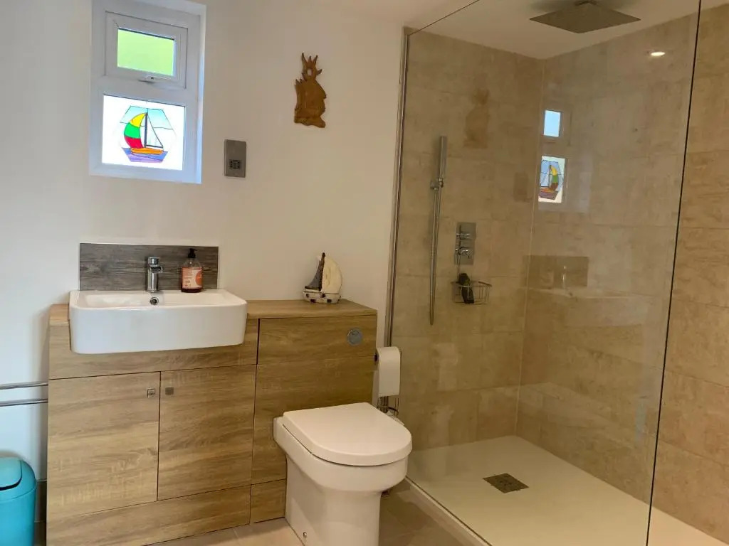 One bedroom self contained annex with own bathroom, sitting room and kitchenette