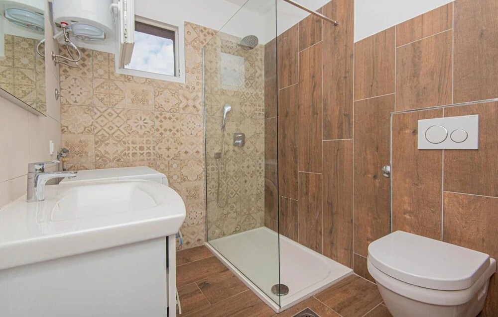 Awesome Home in Jezera with Hot Tub, WiFi & 1 Bedrooms