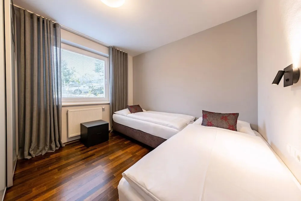 der Sonnberg Alpinlodges - Apartments mit Seeblick, privater Sauna und Self Check-In