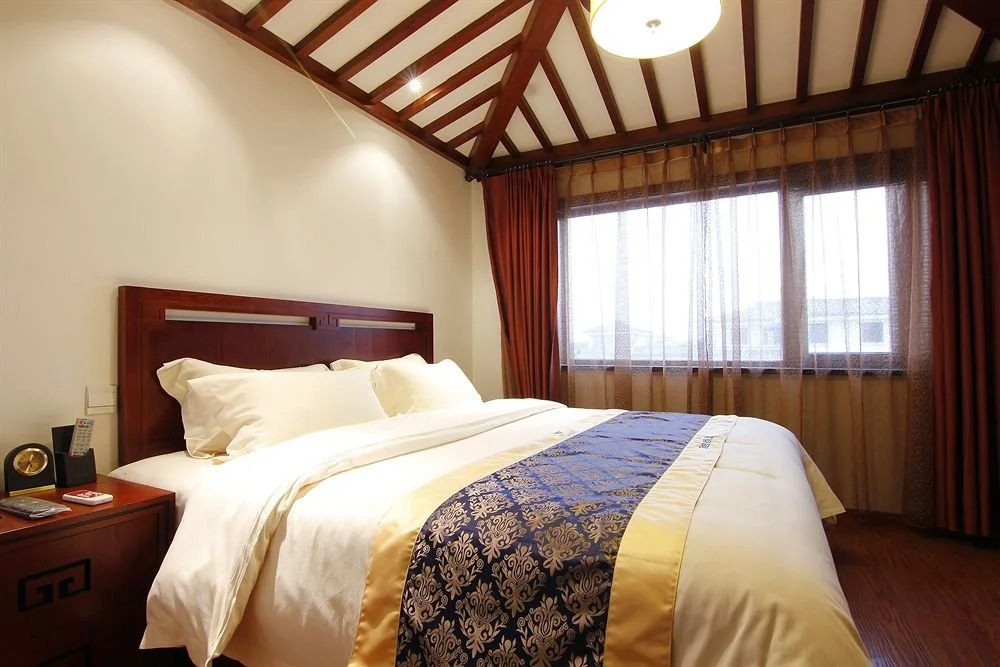Linyi Tujia Sweetome Vacation Rentals
