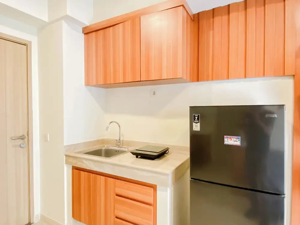 Homey Wooden Touch 2Br At Apartment Meikarta District 1