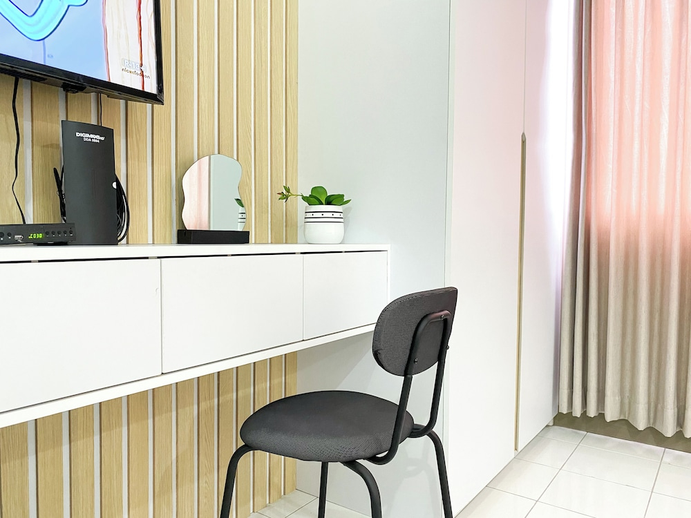 Minimalist And Homey Studio At Grand Kamala Lagoon Apartment