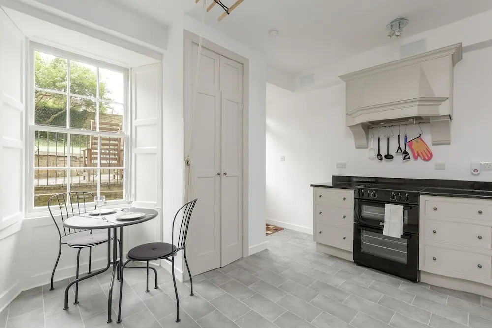 Classic Main Door Entry 2-bedroom New Town Apartment with Garden