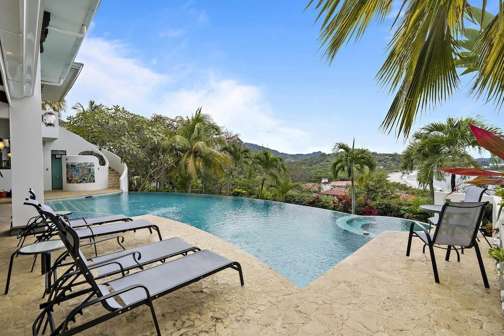 Dreamy Spanish-Style Villa with Sweeping Ocean Views, Elegant Nautical Design & Giant Infinity Pool