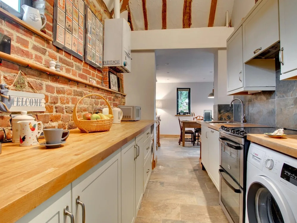 Converted Barn With Excellent Wooden Beams, High Ceiling and a Cosy Terrace