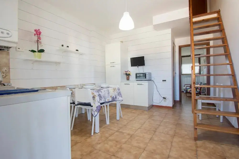 ALTIDO Lovely 1BR flat with patio and parking