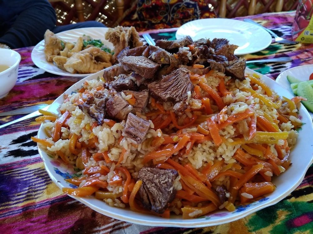 Таджикские блюда фото. Национальный плов Таджикистана. Ош плов таджикский. Таджикистан традиционный плов. Плов Таджикистанский.