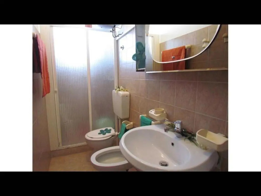 Beachfront Condo Lido dei Pini - Airco - Private Parking - Beach Place