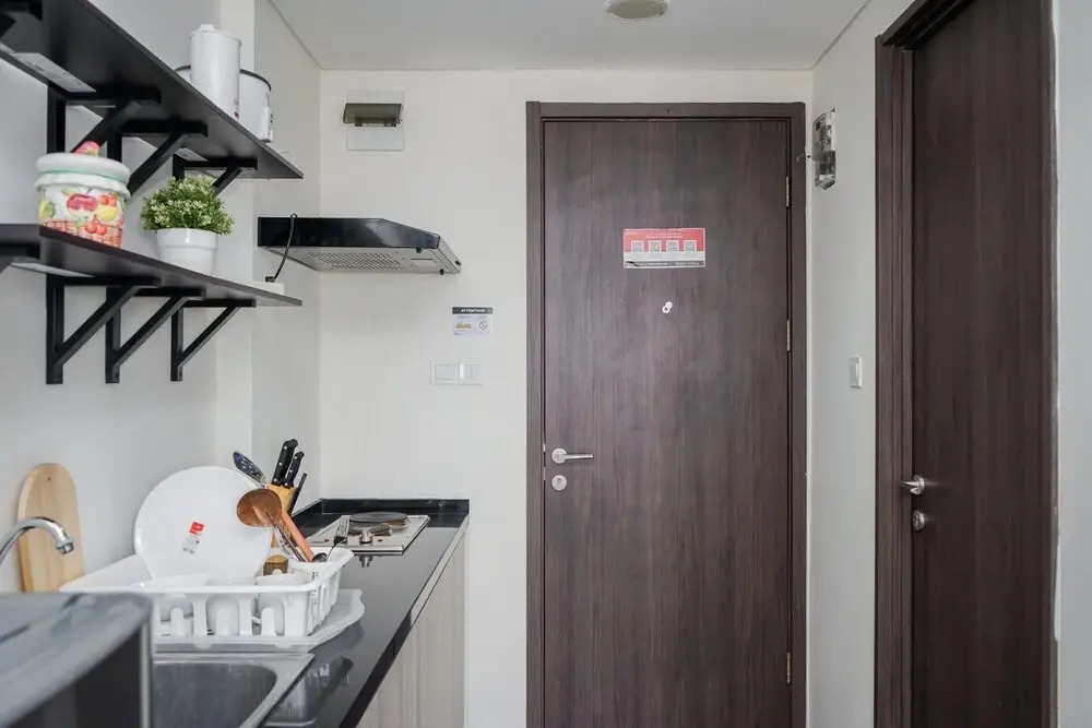 Compact and Monochrome Studio Room Bintaro Icon Apartment
