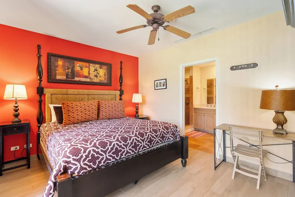 Luxe! Impressively designed 2nd-floor unit in Coco done in red and orange hues