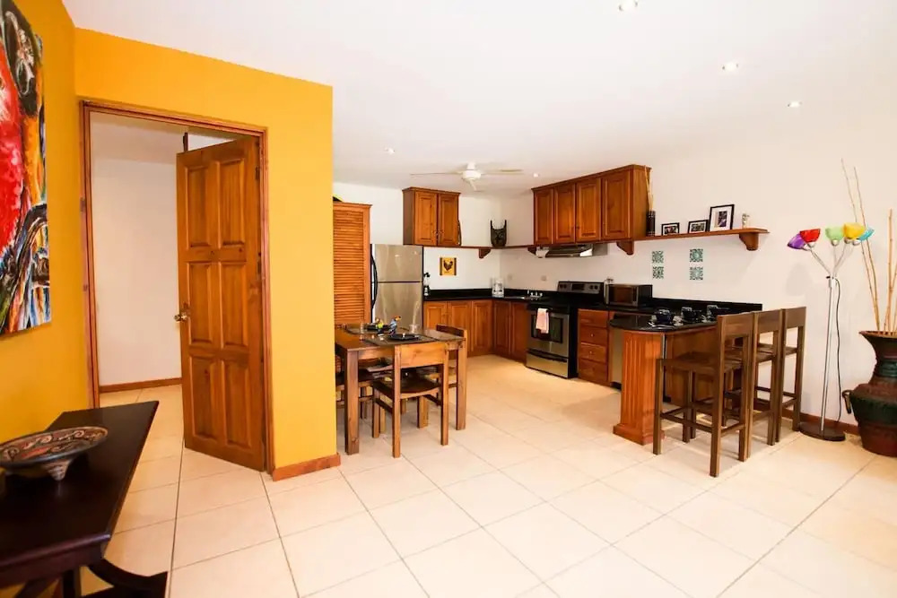Cozy Garden Condo with Vibrant Tropical Decor, Swimming Pool and Rancho