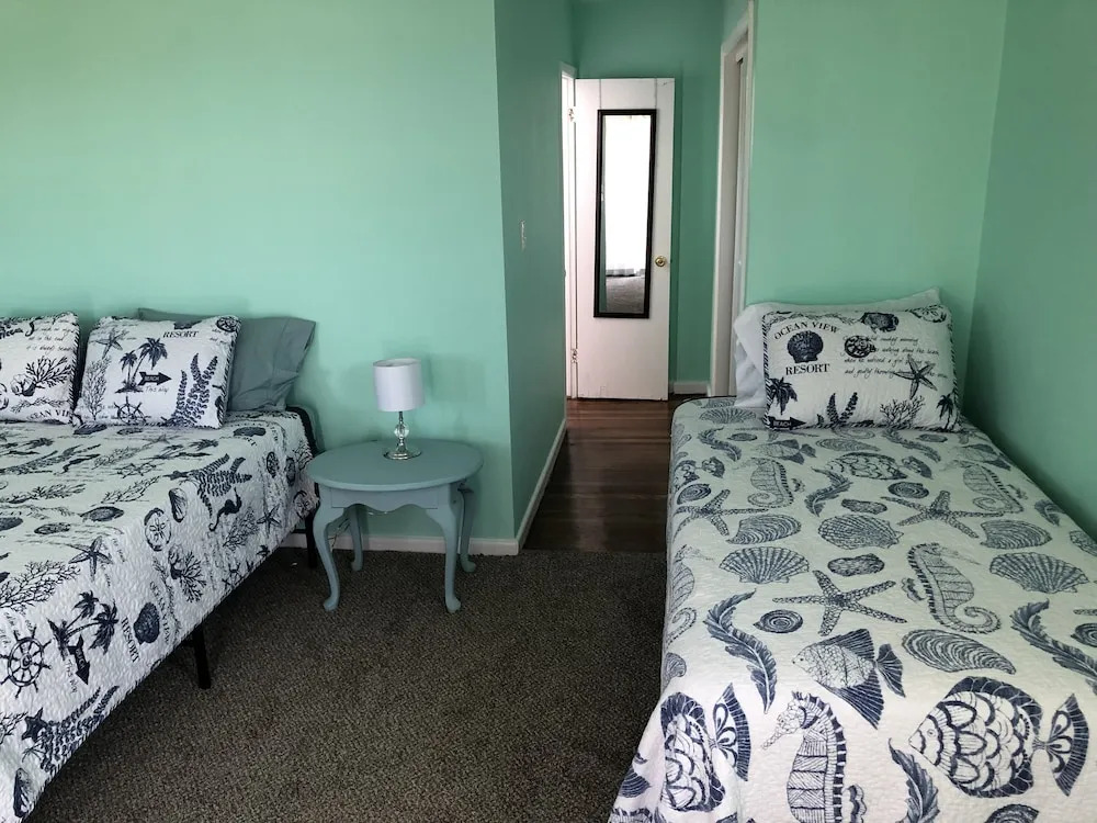 Beach Front On The Bay In Our Rustic, Pet Friendly Cottage 4 Bedroom Cottage by RedAwning