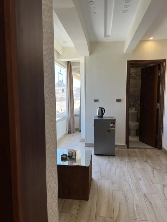 Pyramids Palace view inn With Rooftop Access & free airport pickup