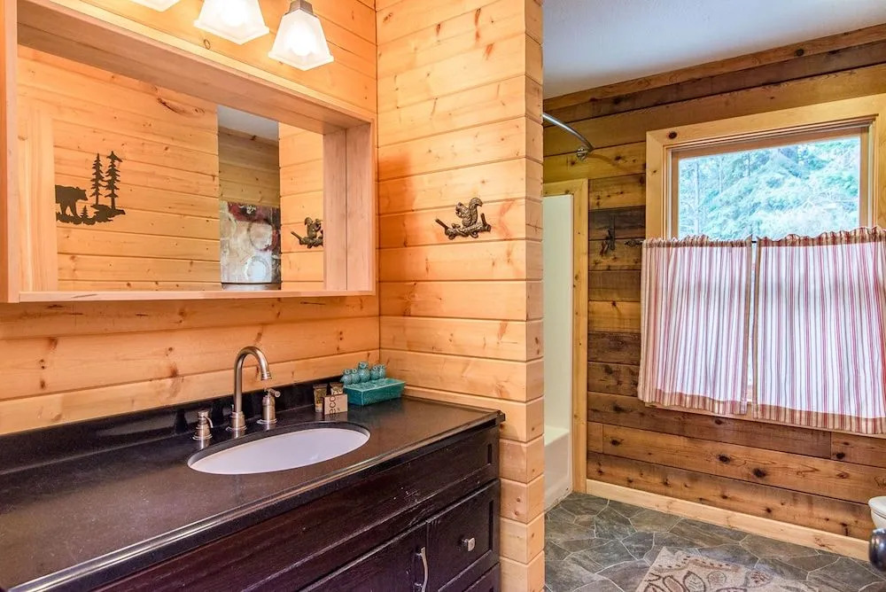 Modern Cedar Log Cabin w Hot Tub by RedAwning