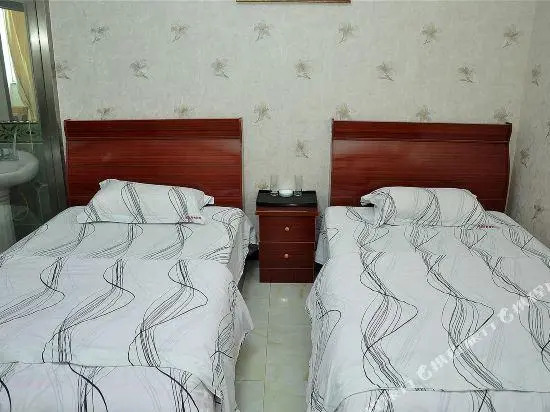 Yinan Shangjia Express Business Hotel