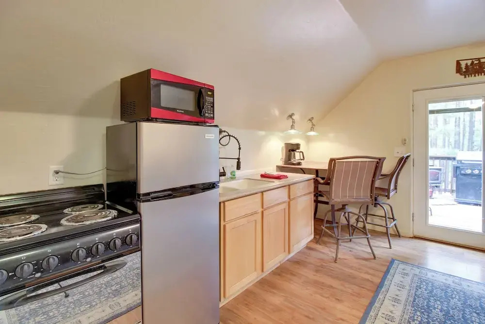 1 Mi to Rainbow Lake: Wooded Retreat w/ Deck!