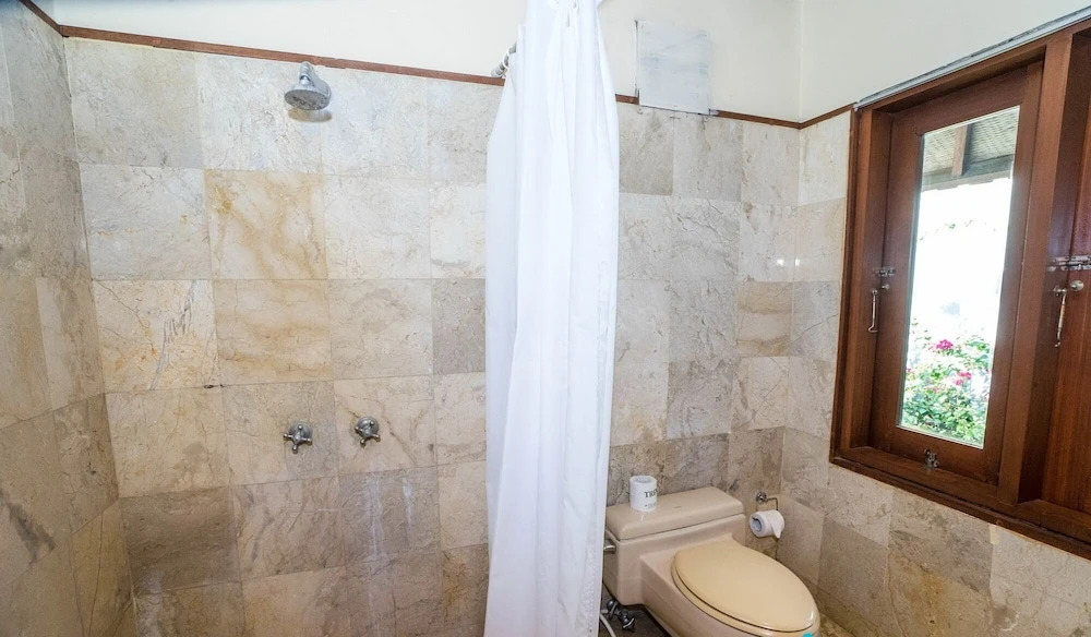 3 bedroom villa river side Legian