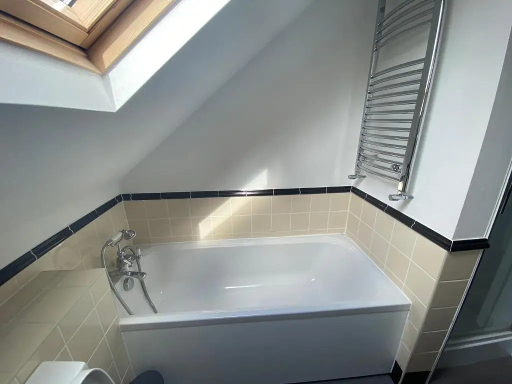 Pristine 2 bedroom apartment with off street parking