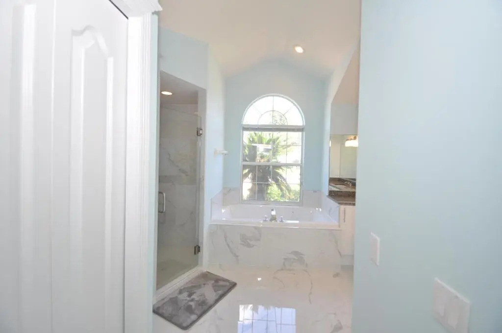 Sunset Bay Beautiful Pool Home - Bring Your Boat or Jet Ski - Canal with Dock- Sleeps 10 - 4 BD