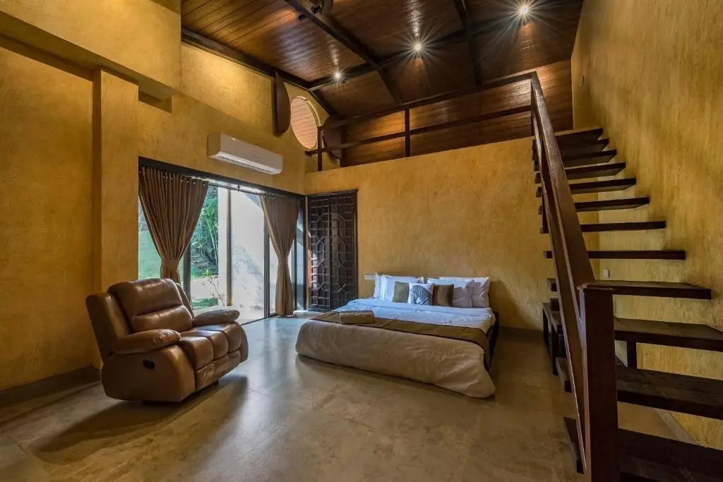 SaffronStays Althea - 4BR veg-only luxury villa with pool, jacuzzis, gourmet meals and Lohagad-Pawna lake views