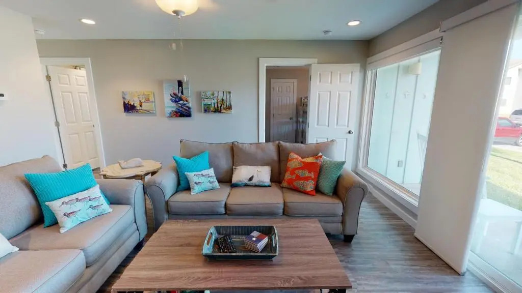 AH-E117 Remodeled First Floor Condo, Across From The Shared Pool & Hot Tub, Near Marina & Ferry