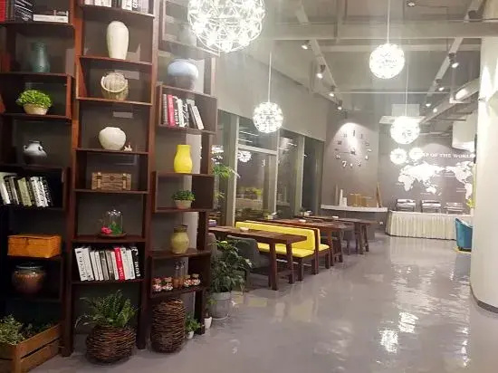 Rose Art Hotel (Ningbo Beilun Yintai City Store)