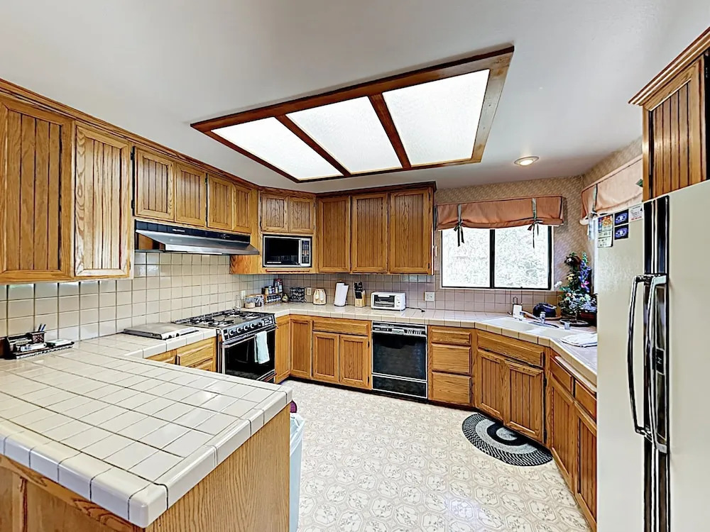 New Listing! Fireside Fun W/ Deck, Game Room & Bar 2 Bedroom Home