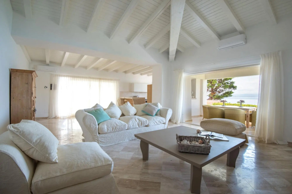 It features a large living area with fully equipped open kitchen and access to the covered terrace d-S'ABBA 1