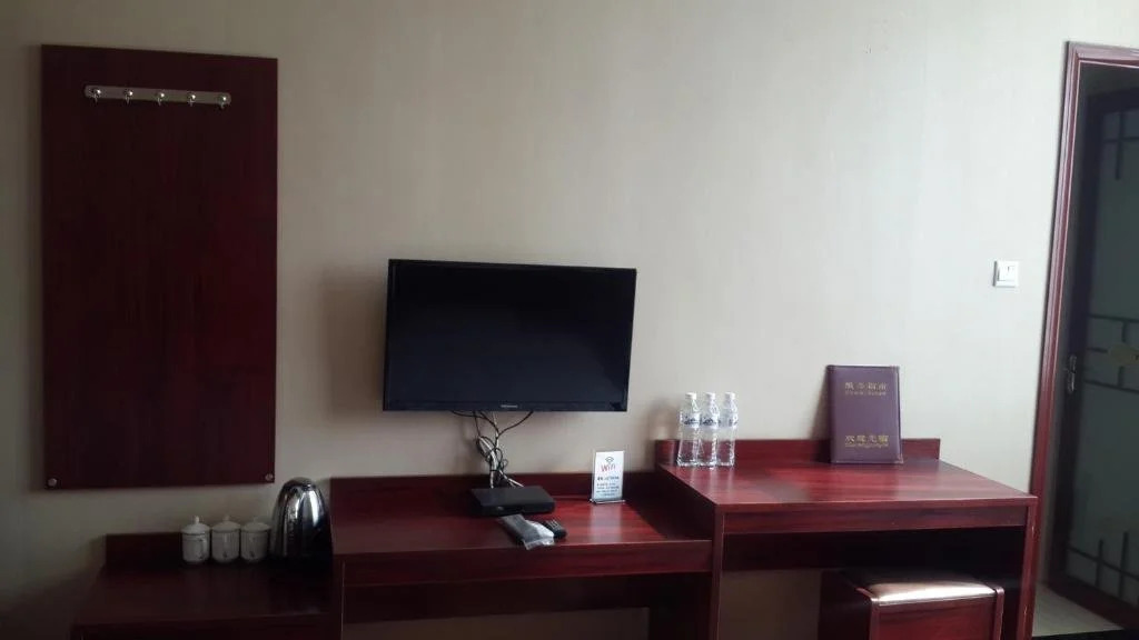 Wanlong Business Hotel