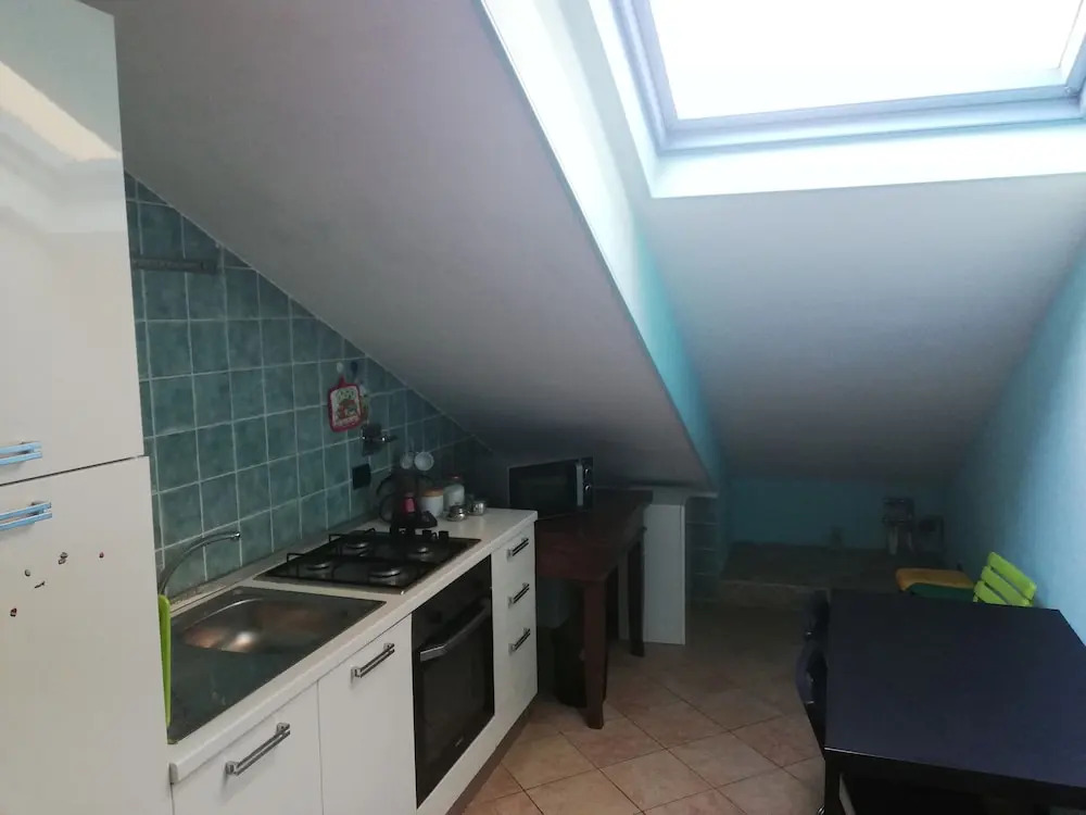 Casa con giardino