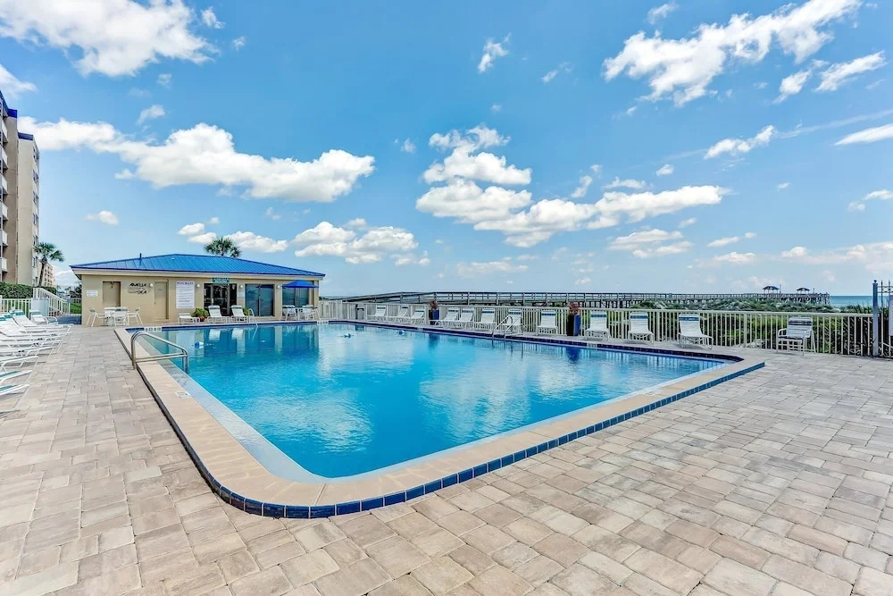 Fully Remodeled Condo with Atlantic Ocean View and Access to Private Fishing Pier by RedAwning