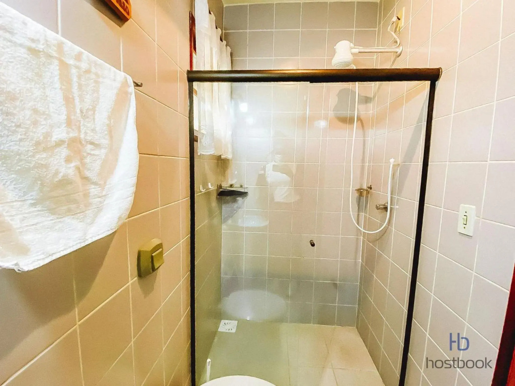 Casa a 300 metros da praia do Centro - WIFI 200MB - Netflix - 2 Quartos - Cozinha equipada - Churrasqueira - Pet friendly - Quintal