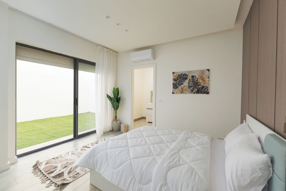 ALSAWAH 2BR Garden - Lake View Residence
