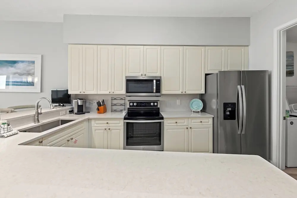 NEWLY RENOVATED! Breathtaking views! Fourth Floor! Pools! Grill! Beach Chairs
