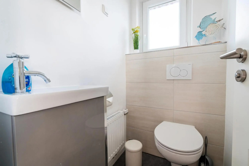 Ferienhaus Steuerbord mit Kamin, Terrasse und Boot
