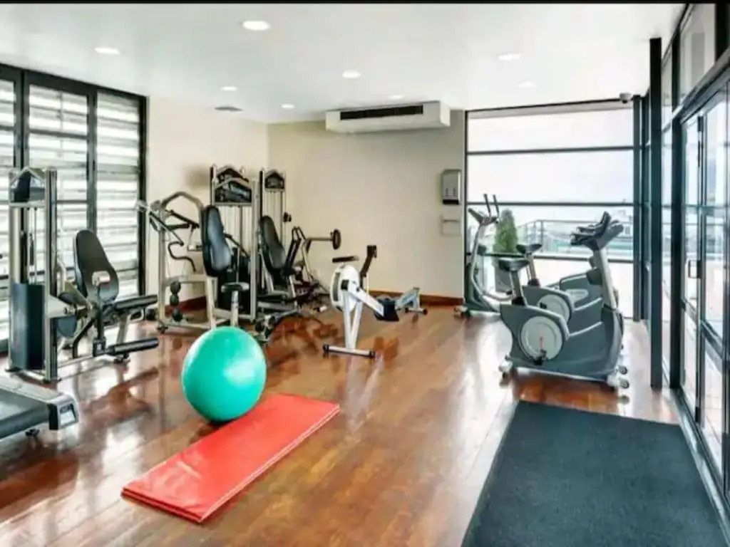 Lovely Bright Apt w/ Pool and Gym by Zodiak Stays