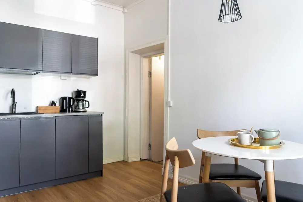 A bright wooden studio for four
