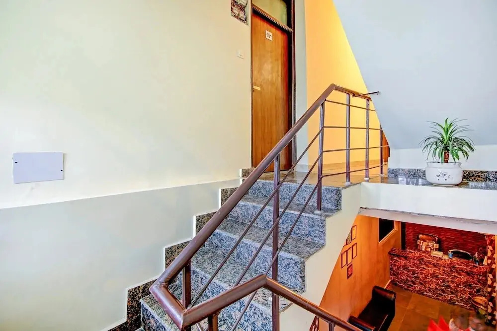 The Rosewood Hotel by OYO Rooms