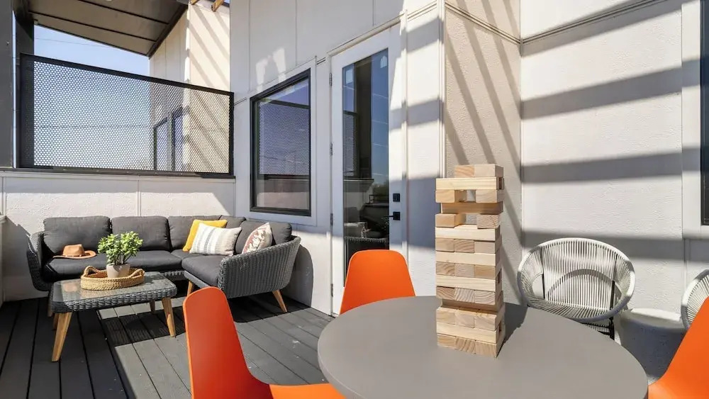 Sleeps 44 4 Themed Lofts w/ Skyline Balconies, Neon Backdrops & Glam Kitchensperfect for Nashville Group Stays The Swift Retreat by Avantstay