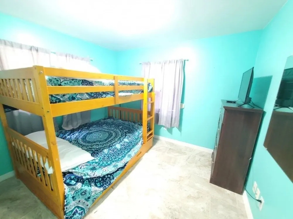 Tiki Beach Queen 3 Bedroom Home by Redawning