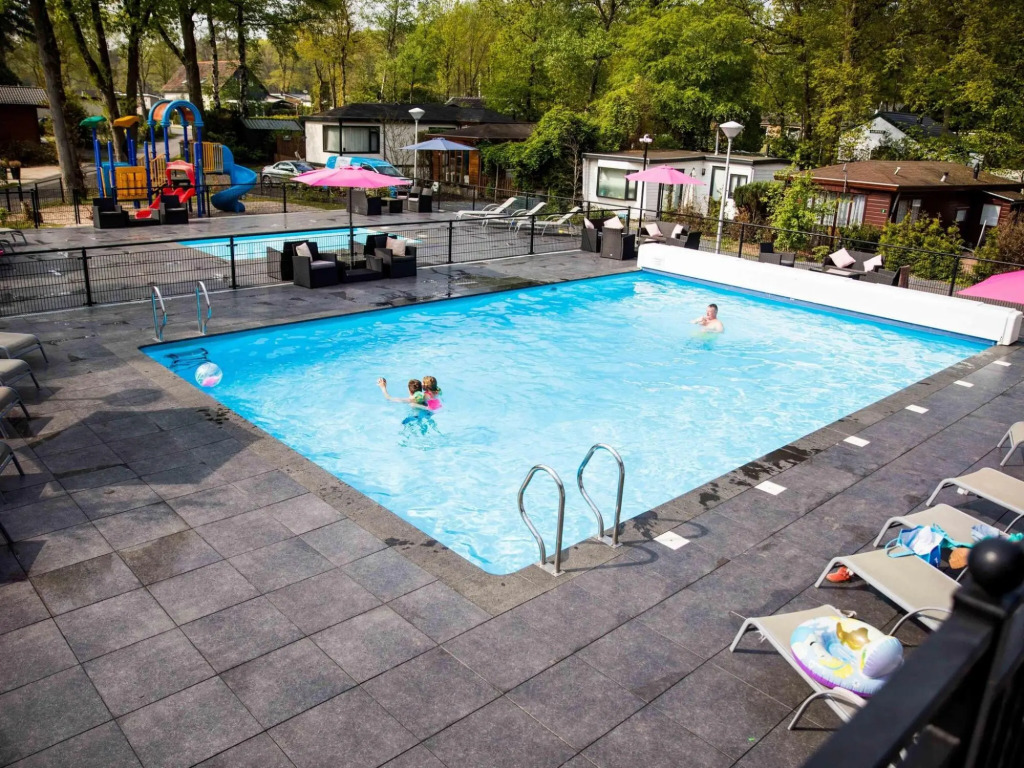Comfortable chalet with outdoor spa, in a holiday park located near the Veluwe