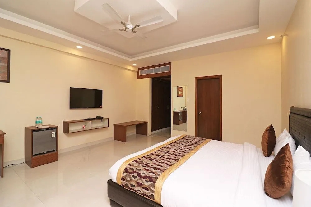 OYO 26911 Kcg Hotels