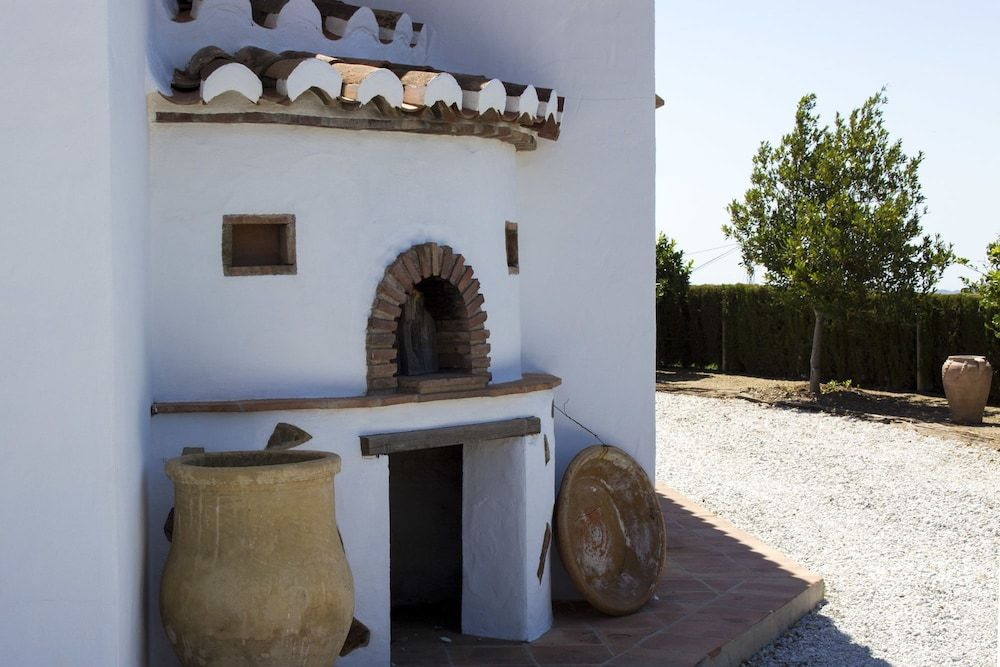 Casa Adrian Almachar by Ruralidays