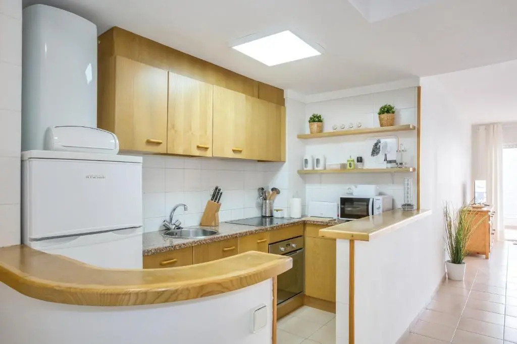 Lets Holidays White Apartment with Terrace, AC & Parking, Near Beach